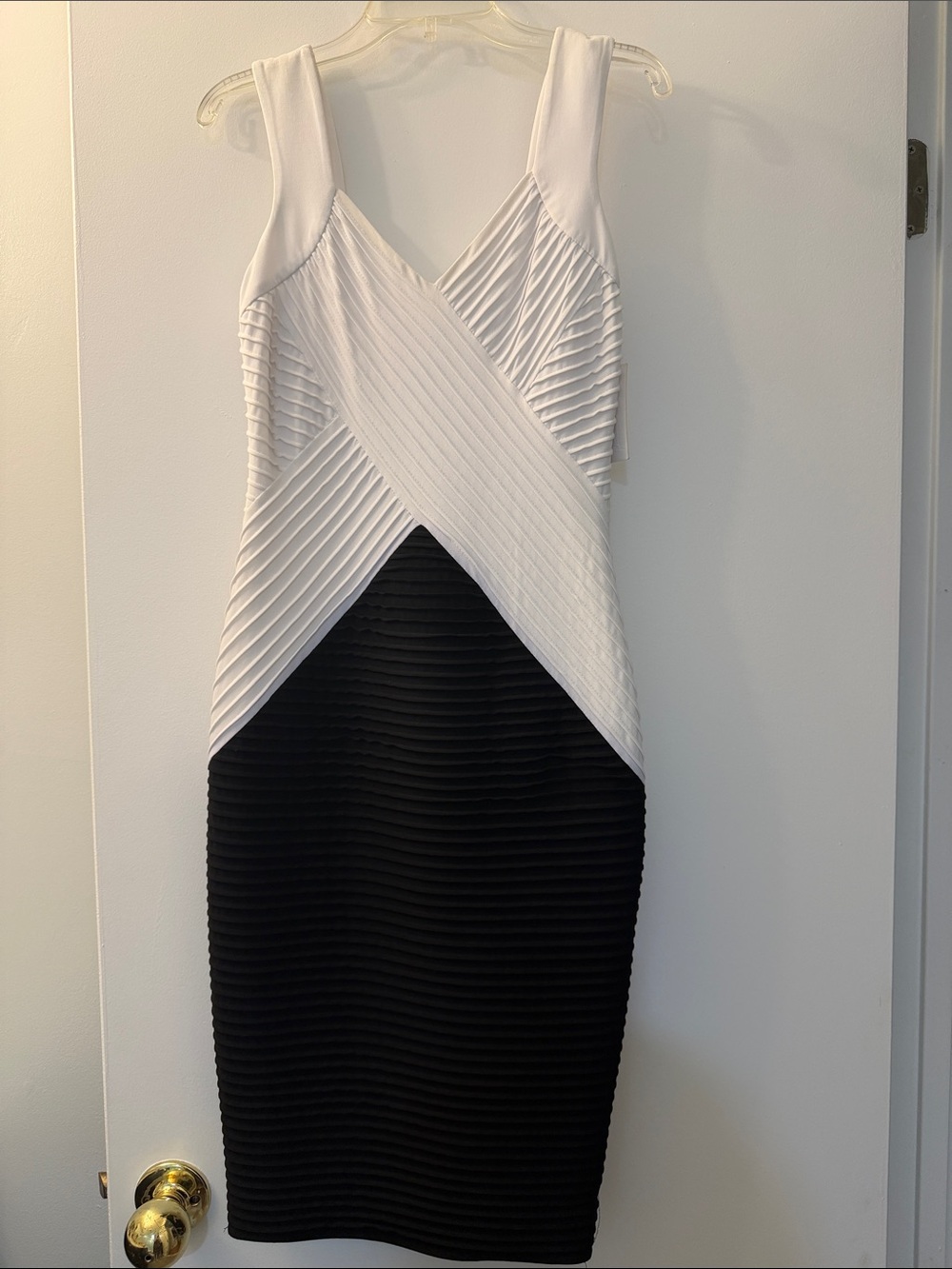 Calvin Klein White and Black Sleeveless Pleated Dress.